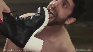 The muscled dominatrix beats and dominates her slaveboy