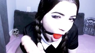 Wednesday Addams fucks a big dildo and gets cum sprayed on her face in a steamy session