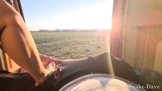 A couple is having fun in the camper on the open road