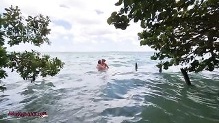 A couple enjoy amazing sex in the outdoor pool of a luxurious blue lagoon