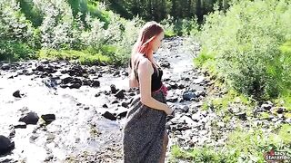 Redhead girl fucks outdoors and gets a creampie