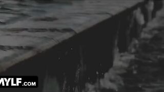 A hot MILF is seducing the young pool guy with her huge boobs