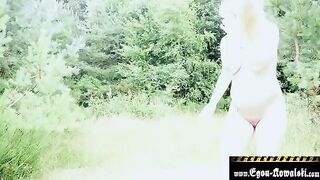 A pregnant blonde woman fucks with an old man on the beach