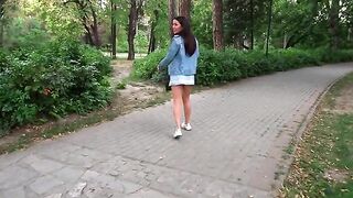 A quick blowjob with a stunning brunette in the park, ending with cum in her mouth