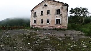 An exhibitionist girl is walking in abandoned buildings with her hot babe