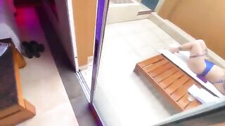 A sexy redhead has sex in a bikini with an employee on cam