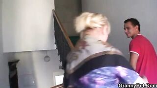 Old granny with freckles enjoys riding a big cock