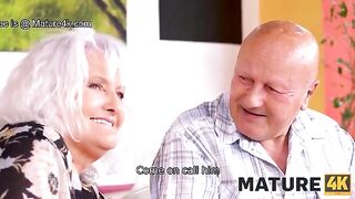 A mature woman seduces her husband’s friend at the table
