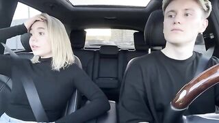 A girl paid for a taxi ride with her mouth in the car outdoors