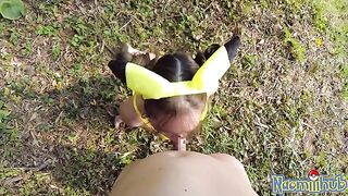 A hot girl in ermine is caressed with tenderness by a guy in public