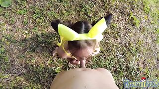 A hot girl in ermine is caressed with tenderness by a guy in public
