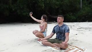 A petite girl meditates on the beach and gets a deep blowjob from a stranger
