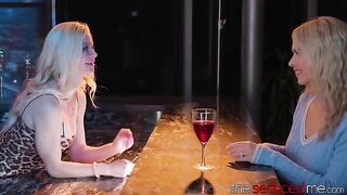 The girl is being served by a hot lesbian bartender who will seduce her