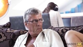 An old man fucks his son's red-haired girlfriend with a messy finish