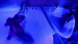 A blonde is indulging in solo play with toys in the bathroom