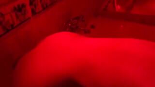 A blonde is indulging in solo play with toys in the bathroom