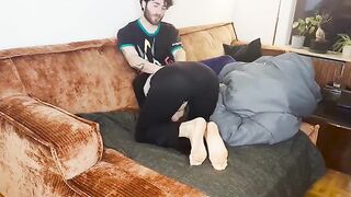 A couple has a passionate sex session under the blanket and reaches an intense climax together