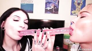 Two lesbian beauties fuck each other with a double-ended dildo
