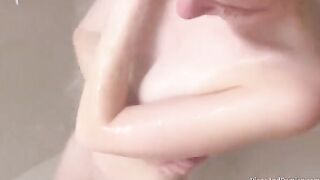 We shower, massage each other, and have sex over the couch in a steamy session