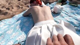 A man and his girl have sex on the beach, enjoying the kebabs