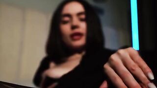 A cute young chick with big boobs gets her pussy smeared with oil