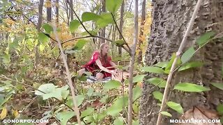 A little girl in a red riding hood dress is being fucked by a big man in the forest