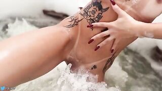 Girl is having fun in the hotel pool with a guy