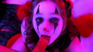 A kinky clown blowjob scene with a facial finish, exploring intense eye contact and costume play