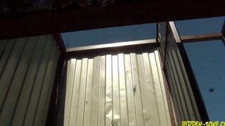 Spy camera footage of a woman in a beach house