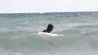 A group of girls sunbathed naked on the beach