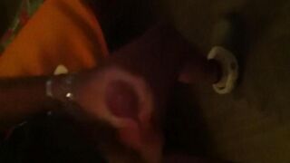 The guy rubbed his dick in front of the mirror and came