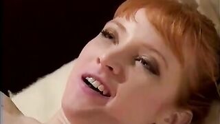 Lesbian beauties are having fun with a strapon