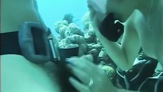 A guy has sex with a girl right in the swimming pool water