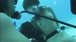 A guy has sex with a girl right in the swimming pool water