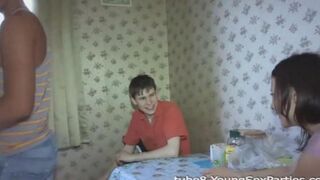 Foursome sex of two couples at a friend's home