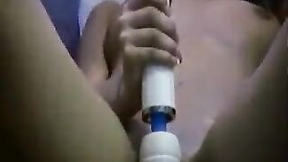 A girl guides her friend's hand, showing her how to masturbate properly