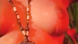 A hot brunette gets naked and masturbates at home, being watched
