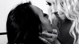 Lesbians fuck each other with dildo on the bed