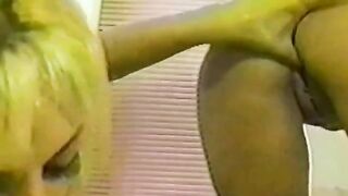 A couple of girls are having fun with each other in the shower