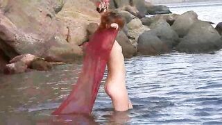 A sexy girl has small boobs and takes off her clothes