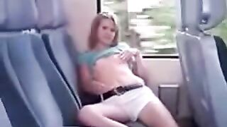 A bus passenger ironed her cunt through panties by lifting the skirt
