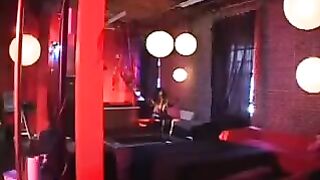 A black woman in a latex suit rides a member with intense passion