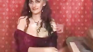 A close up shot of a hot brunette with a hairy pussy masturbating