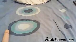 The beauty checks the strength of her new toys on a webcam