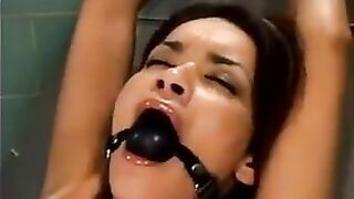 A bald guy fucked a girl using a sex machine in a hardcore scene