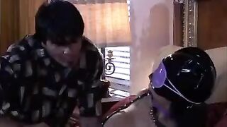 A woman plays a BDSM game with her adult mistress wearing sexy lingerie