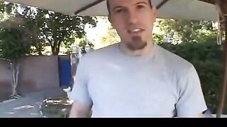 The baby carefully sucks the guy's nipple and caresses his cock