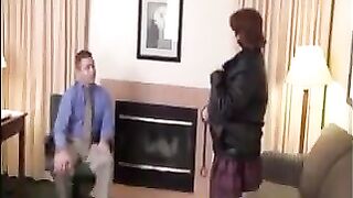 A fat woman has sex with her boss on the couch