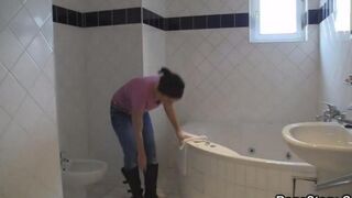 A young and sexy brunette has a wild shower session all to herself