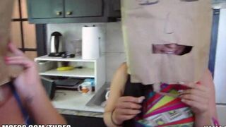 Two girls wear bags on their heads and have sex with guys in an orgy